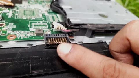 Checking laptop battery pins Stock Footage 272573783