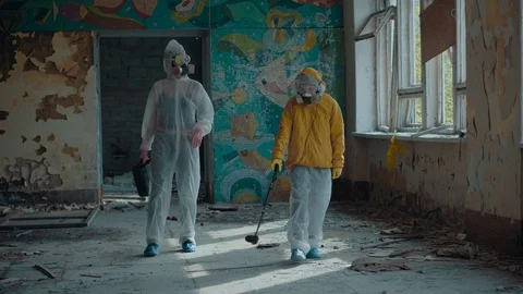 Checking the level of radiation in an abandoned room. Stock Footage 109905349