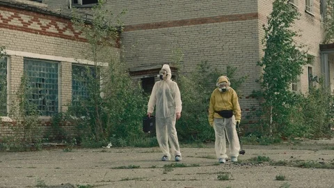 Checking the level of radiation in an abandoned territory.  Stock Footage 111449653