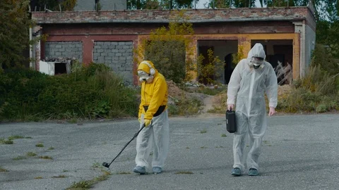 Checking the level of radiation in an abandoned territory.  Stock Footage 111449757