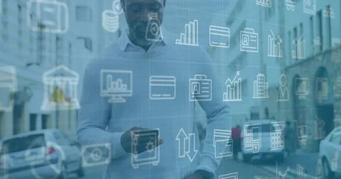 Checking mature man using smartphone and viewing digital overlays at city Stock Photos
