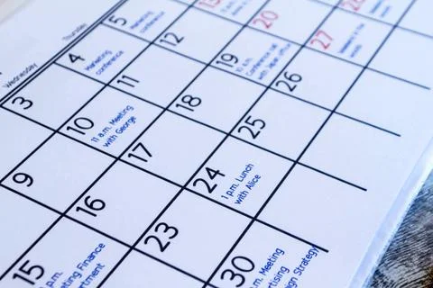 Checking monthly activities in the calendar Stock Photos