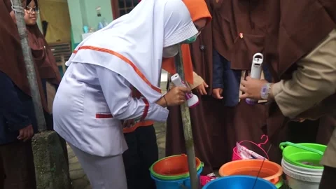 Checking mosquito larvae with the potential for dengue fever Stock Footage 236018081