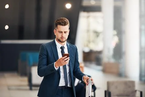 Checking my emails before getting on the flight Stock Photos