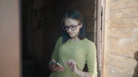 Checking newsfeed on her social network accounts. Pretty girl surfing interne Video stock 95948162