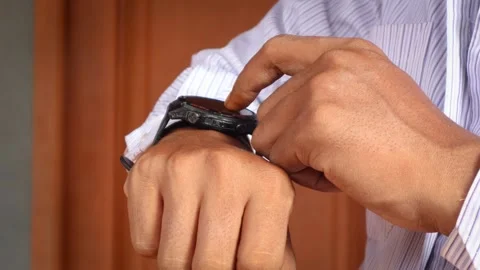 Checking notifications on smartwatch Stock-Footage 334768906