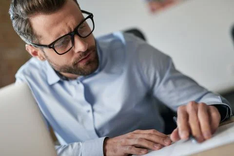 Checking the numbers to make sure everything is right Stock Photos