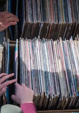 Checking objects in old antiquities market, hands. Fotos de archivo