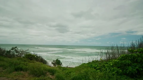 Checking the ocean point break for surfing conditions Stock Footage 152789990