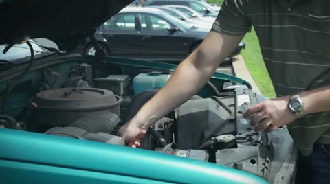 Checking oil Video stock 33465226