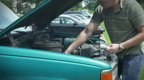 Checking oil Stock-Footage 33640625