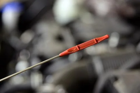 Checking the oil level in the car engine Stock Photos