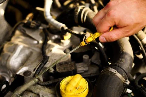 Checking the oil level Stock Photos