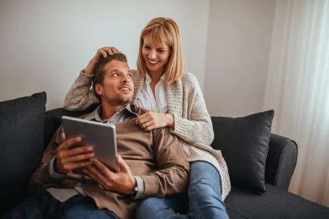 Checking the online news Stock Photos