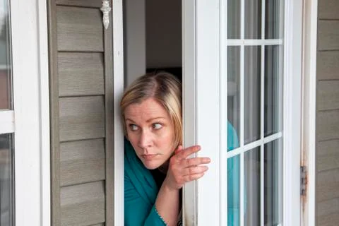 Checking outside house for noises Stock Photos