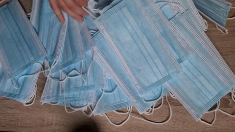 Checking Pack Of Surgical Masks One By One Stock Footage 156104122