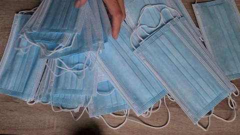 Checking Pack Of Surgical Masks One By One Vídeo Stock 156104133
