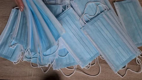 Checking Pack Of Surgical Masks One By One Stock Footage 156104209