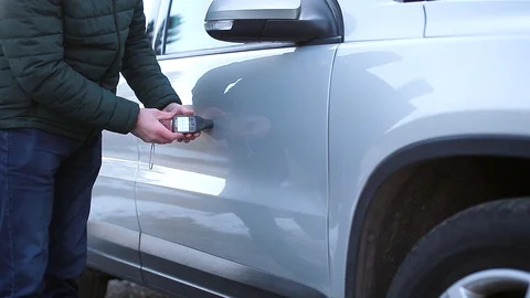 Checking the paintwork on the car Stock Footage 124789630