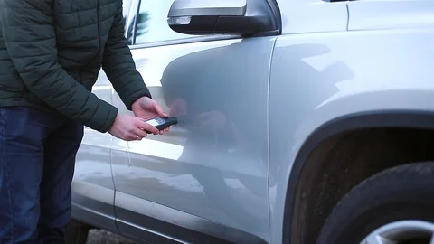 Checking the paintwork on the car Stock Footage 124789636