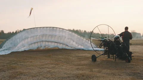 Checking of parachute by air from propeller Stock Footage 152947650