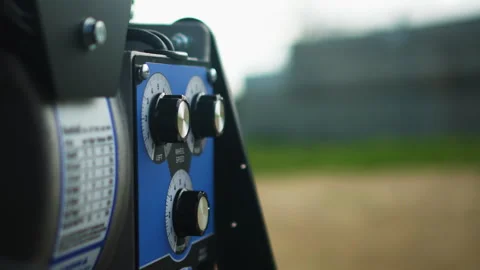 Checking parameters of a baseball pitching machine Stock Footage 303949123