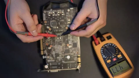 Checking the performance of the video card with multimeter Stock Footage 170272184