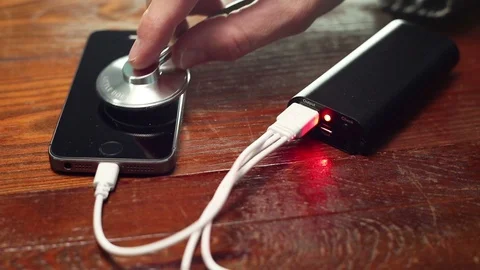 Checking phone and battery with stethoscope. Stock Footage 97220025