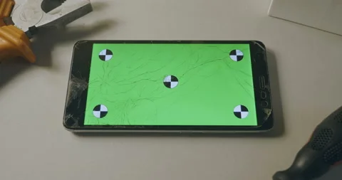 Checking phone with broken screen, smartphone with green screen Stock Footage 93317278