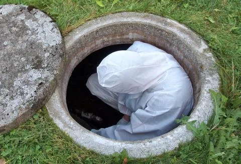 Checking the pipes of the small sewage works Stock Photos
