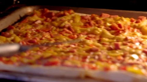 Checking Pizza with Knife Being Baked in the Kitchen Oven Stock Footage 110226626
