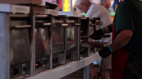 Checking pizzas in many ovens carnival editorial Stock Footage 93216043