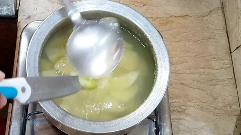 Checking Potato Chunks for Doneness in Pot, Boiling, Kitchen Stock Footage, Stock Footage 329094756