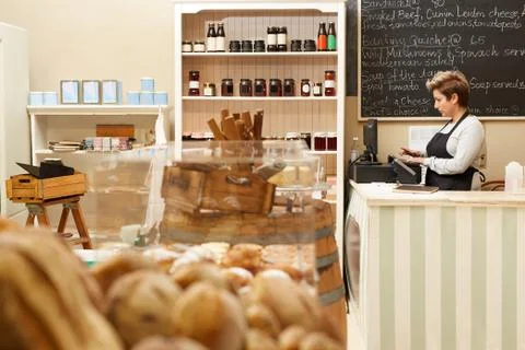 Checking prices on the till Stock Photos