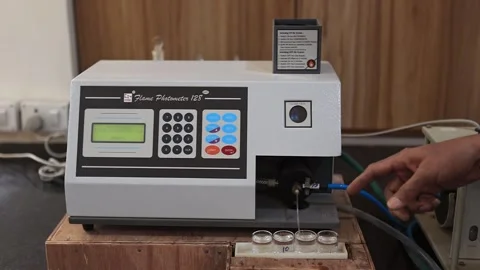Checking production quality in laboratory export flame photometer machine Video stock 250538953