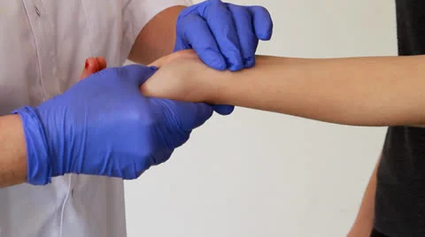 Checking pulse Stock Footage 22555948