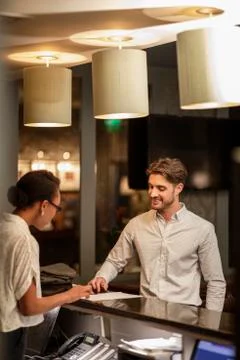 Checking In at Reception Foto stock