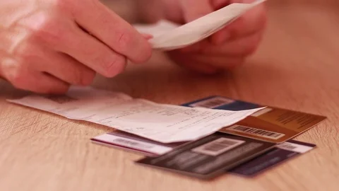 Checking sale receipts Stock Footage 83534435