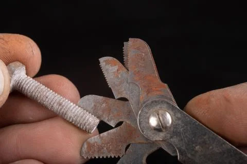 Checking the screw thread with an analog meter. Correctness of the threaded c Stock Photos
