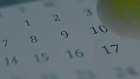 Checking September days on digital calendar on smartphone screen, macro view and Stock-Footage 288964137
