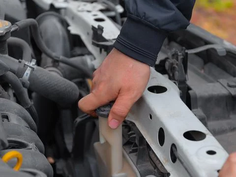 Checking up of serviceability of the car in open hood Stock Photos