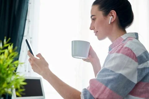 Checking Social Media at Work Stock Photos
