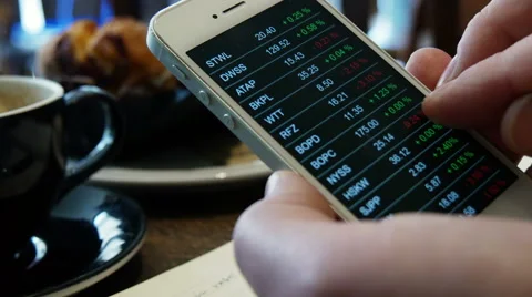Checking stock market data on smartphone, 4k, UHD Stock-Footage 49565731
