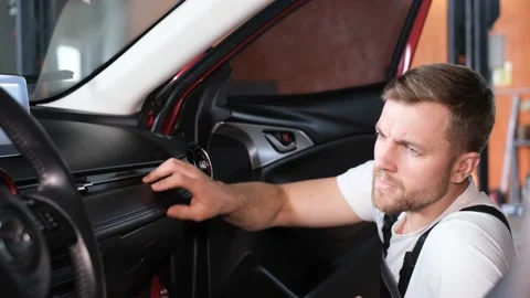 Checking the technical condition of the car from the inside. Stock Footage 212347000