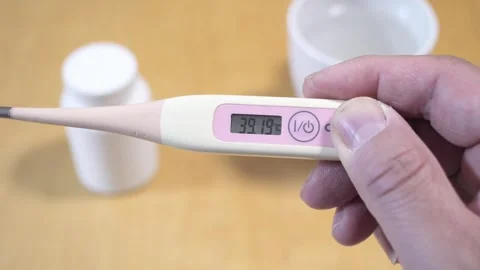 Checking temperature at home with digital thermometer Stock-Footage 266182300