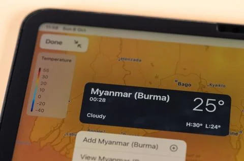 Checking temperature outside in Myanmar city Stock Photos