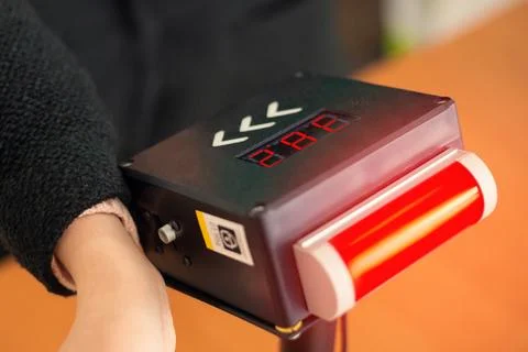 Checking temperature using autonomous thermometer Stock Photos