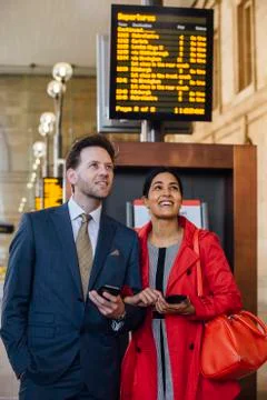 Checking Train Times Fotos Stock