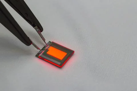 Checking turn on small oled display of red color with a probe station Stock Photos