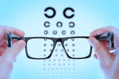 Checking vision on the table Golovin. In the blue shadows. Stock Photos